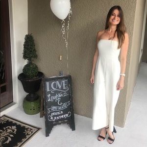 likely white jumpsuit
